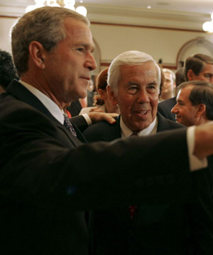 After signing into law the African Growth and Opportunity Act (AGOA) Acceleration Act of 2004, President George W. Bush meets with U.S. Senate Foreign Relations Committee Chairman Dick Lugar in the Eisenhower Executive Office Building. White House photo by Paul Morse.