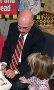 Rep. Waxman shares a book with a young friend during a visit to UCLA?s Reach Out and Read program