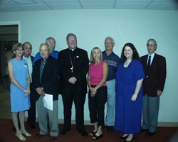 Archbishop Dolan and organ recipients and family members of organ donors.