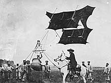 The Cody kite system, progressively larger kites supported a line, a final kite took the observer up the line in a basket.
