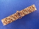 A vintage 14ct gold sapphire set strap bracelet