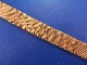 A vintage 18ct gold strap bracelet