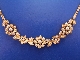 A vintage 14ct gold pearl cluster necklace