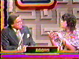 A contestant gives a clue to her partner Bill Cullen.