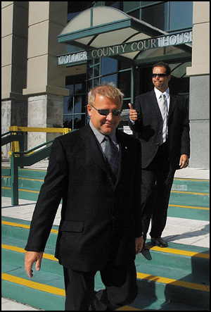Alex and Justin leaving court, click to enlarge