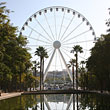 The wheel seen from behind the famous Seville Fountains