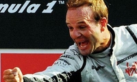 Rubens Barrichello devient dangereux pour Button. (Photo Afp)