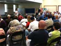 inside a town hall meeting, photo