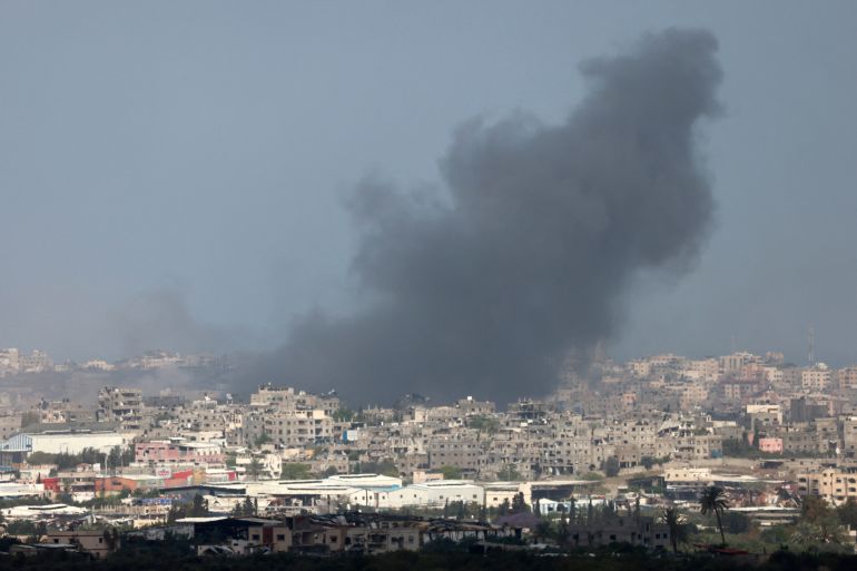 Smoke billows during Israeli bombardment on the Gaza Strip from a position in southern Israel on May 12